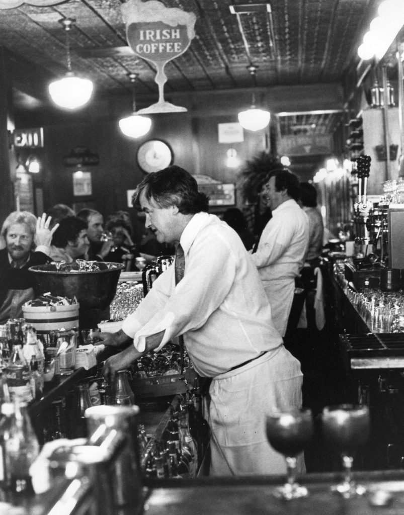 Legendary bartender Michael McCourt behind the bar at Perry's in the 1970s.