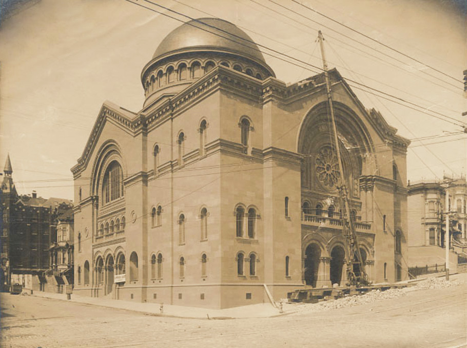 A photograph taken just after the 1906 earthquake shows the damage to the new Temple Sherith Israel. Both 2014 and 2018 Webster are visible behind the temple. In the background is Cooper Medical College.
